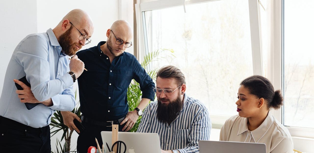 people in an office talking about disaster recovery plans