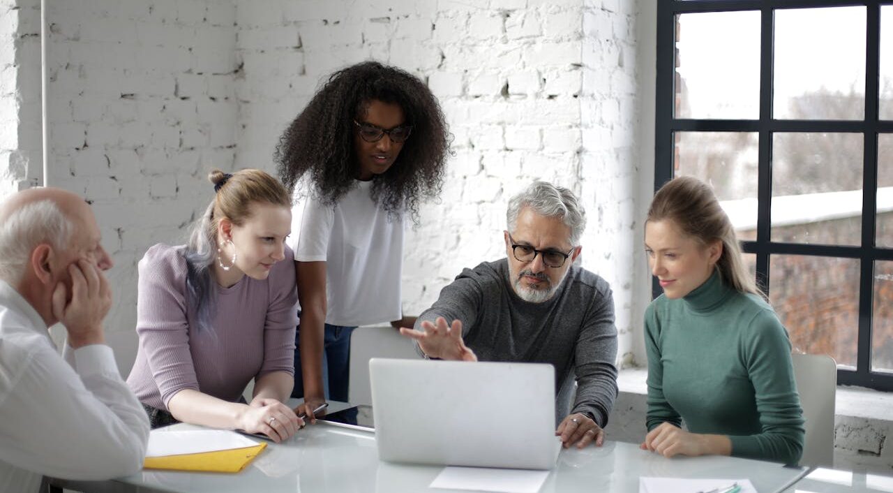 People analyzing business costs