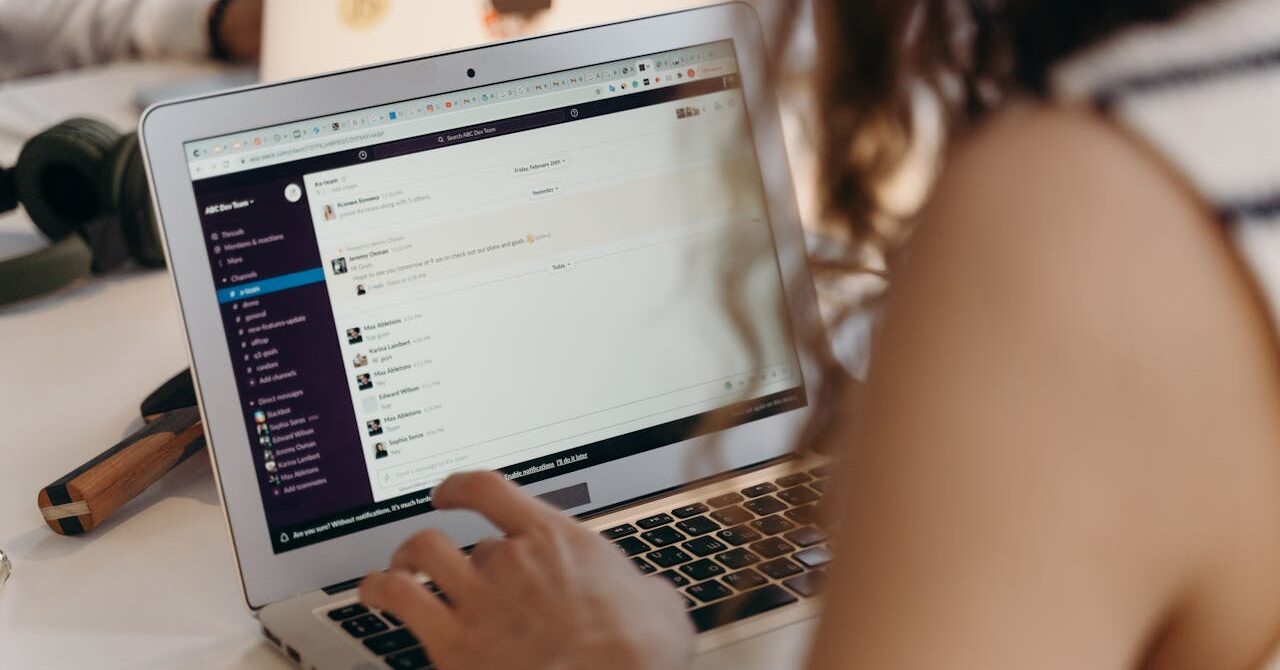 woman using business laptop