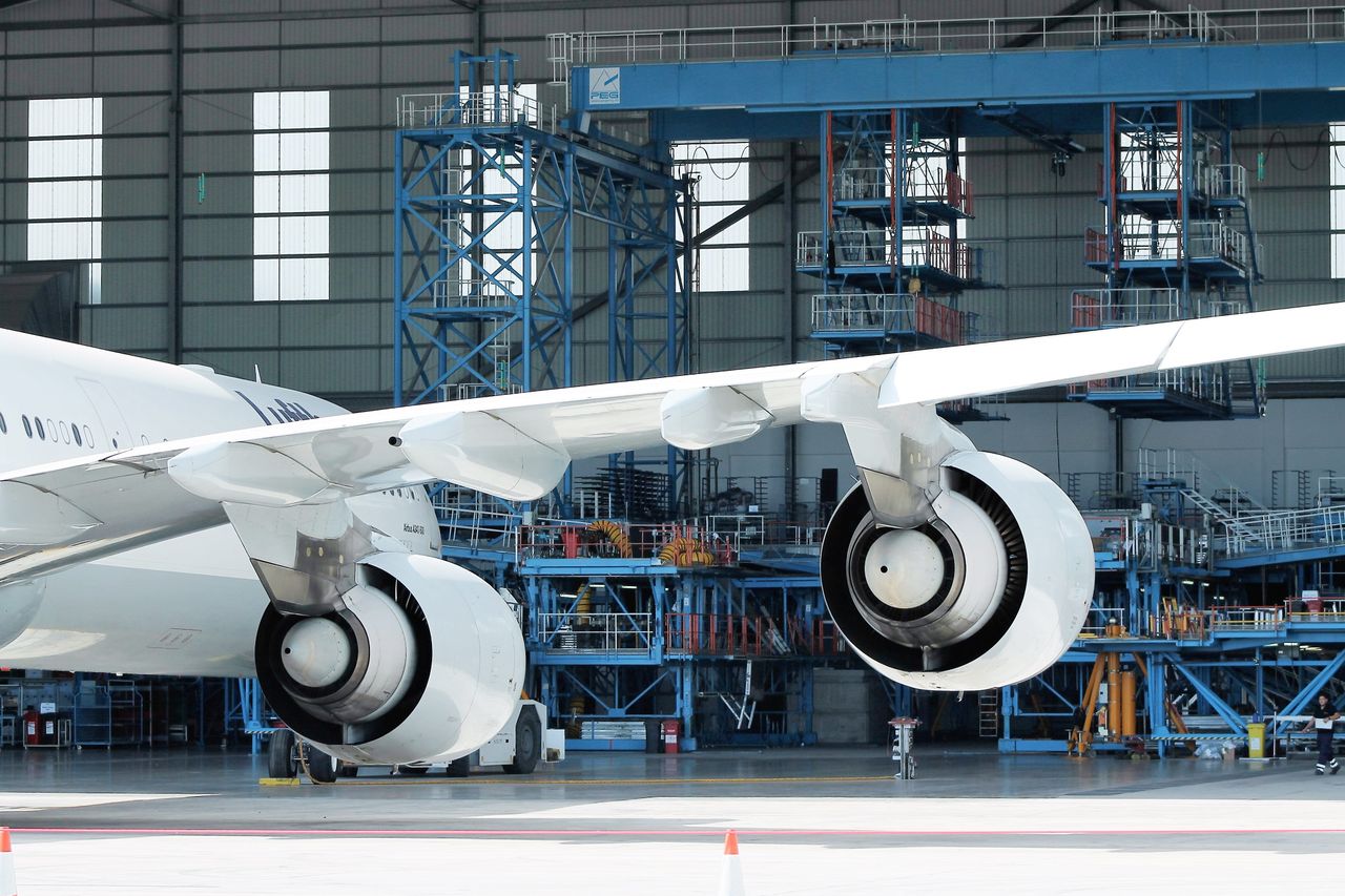 Airplane in a factory setting