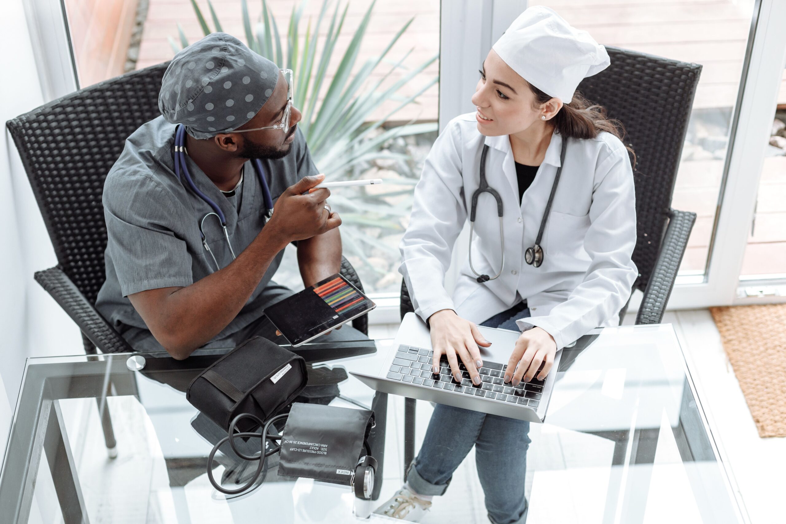 Doctors discussing patient medical records